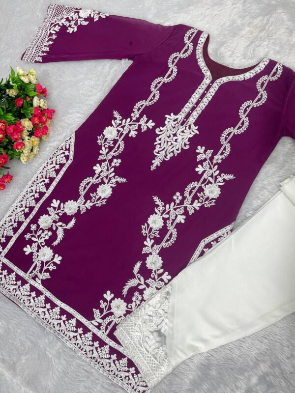 New Designer Black Heavy Georgette Top With Work Palazzo Suit