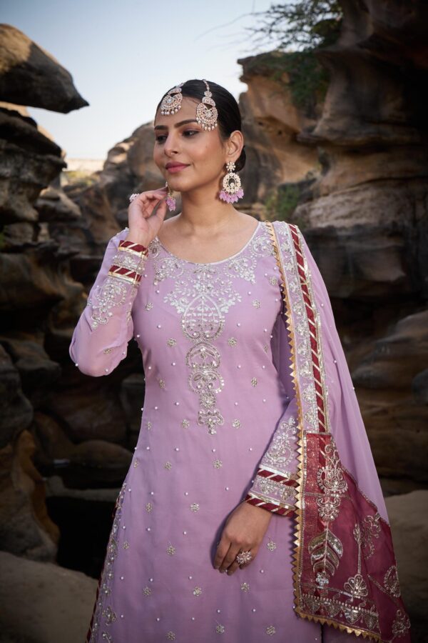 Ready made Sharara Suit with Dupatta with Sequence work.