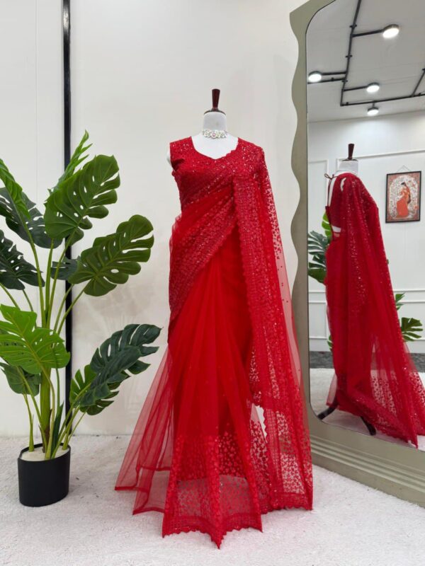Designer Saree on Soft Net Fabric with Sequence work and Blouse.