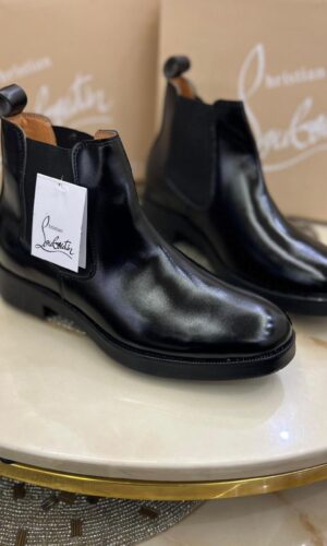 CHRISTIAN LOUBOUTIN BOOTS